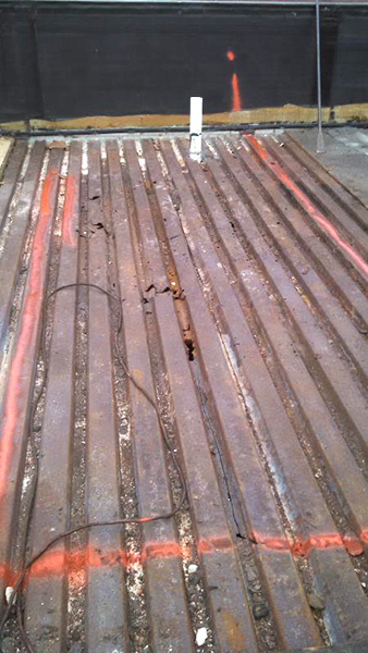 deteriorated-steel-roof-deck Deteriorated roof deck