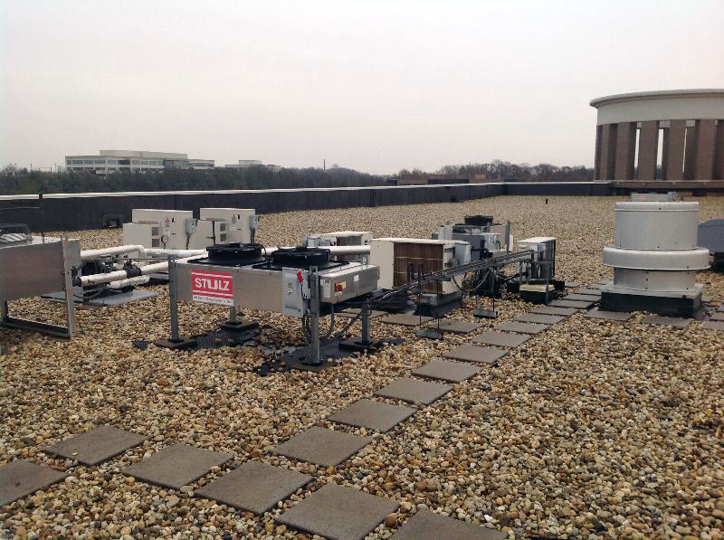Walkway on a ballasted roof system