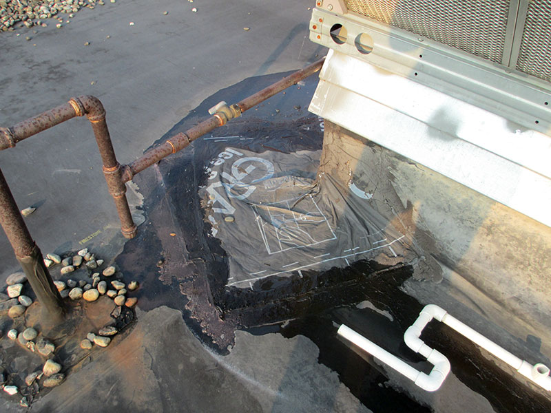 ice-and-water-shield-epdm-repair-1-roof-cement Ice and water shield used to repair an EPDM roof
