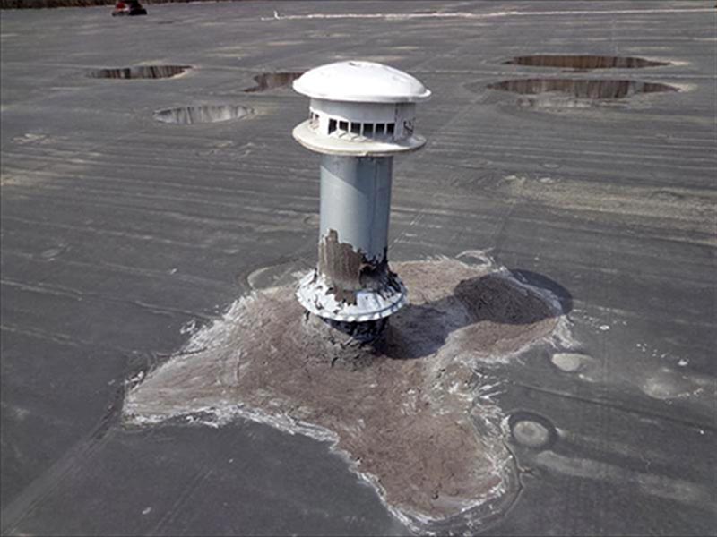 roof-cement-on-epdm-2 Roof cement and fabric used to repair penetration flashing