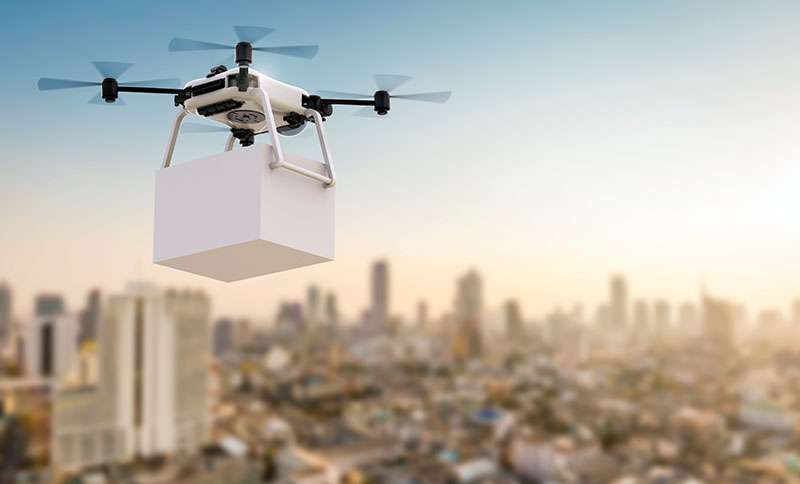 drone-with-package drone-with-package