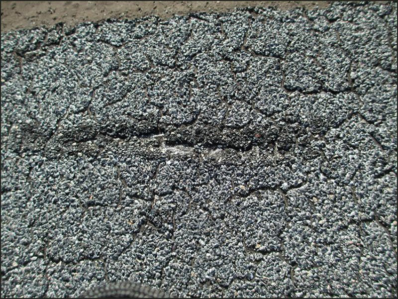 granule-loss-modified Granule loss on modified roof
